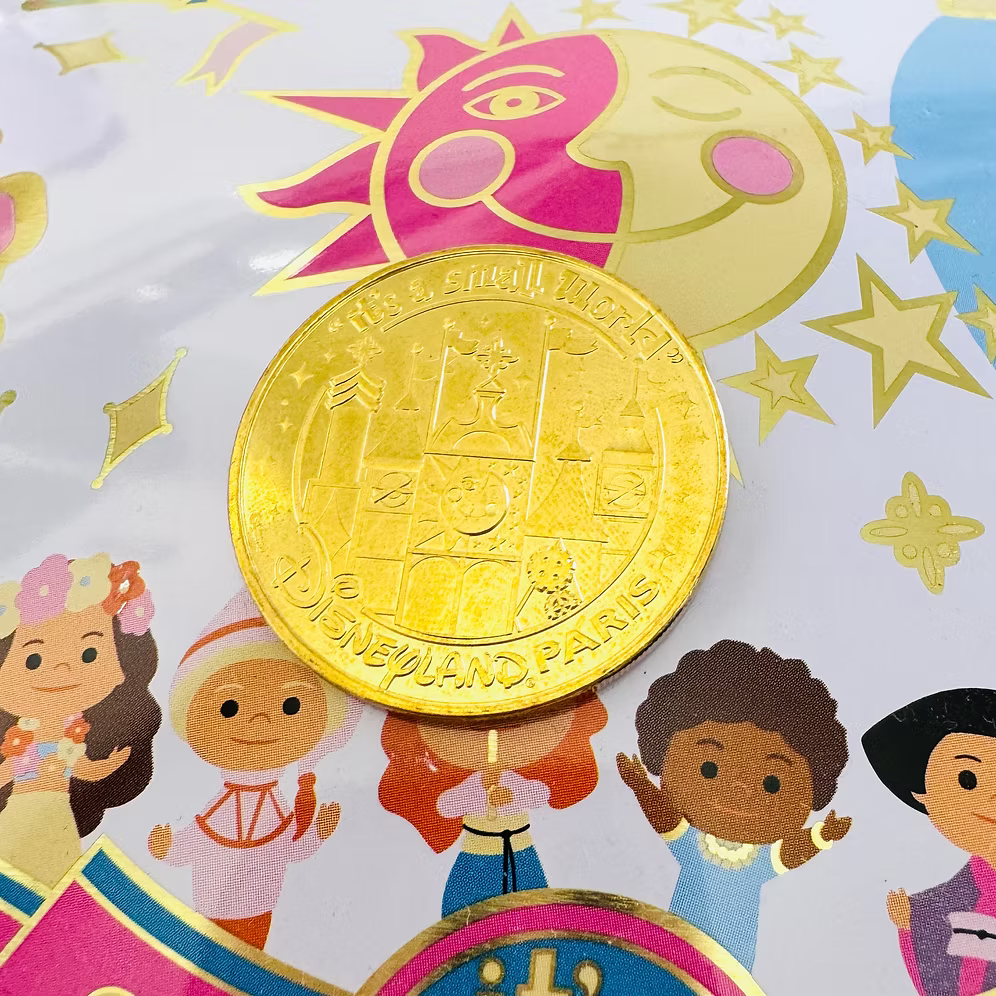 Moneda Small World Disneyland Paris